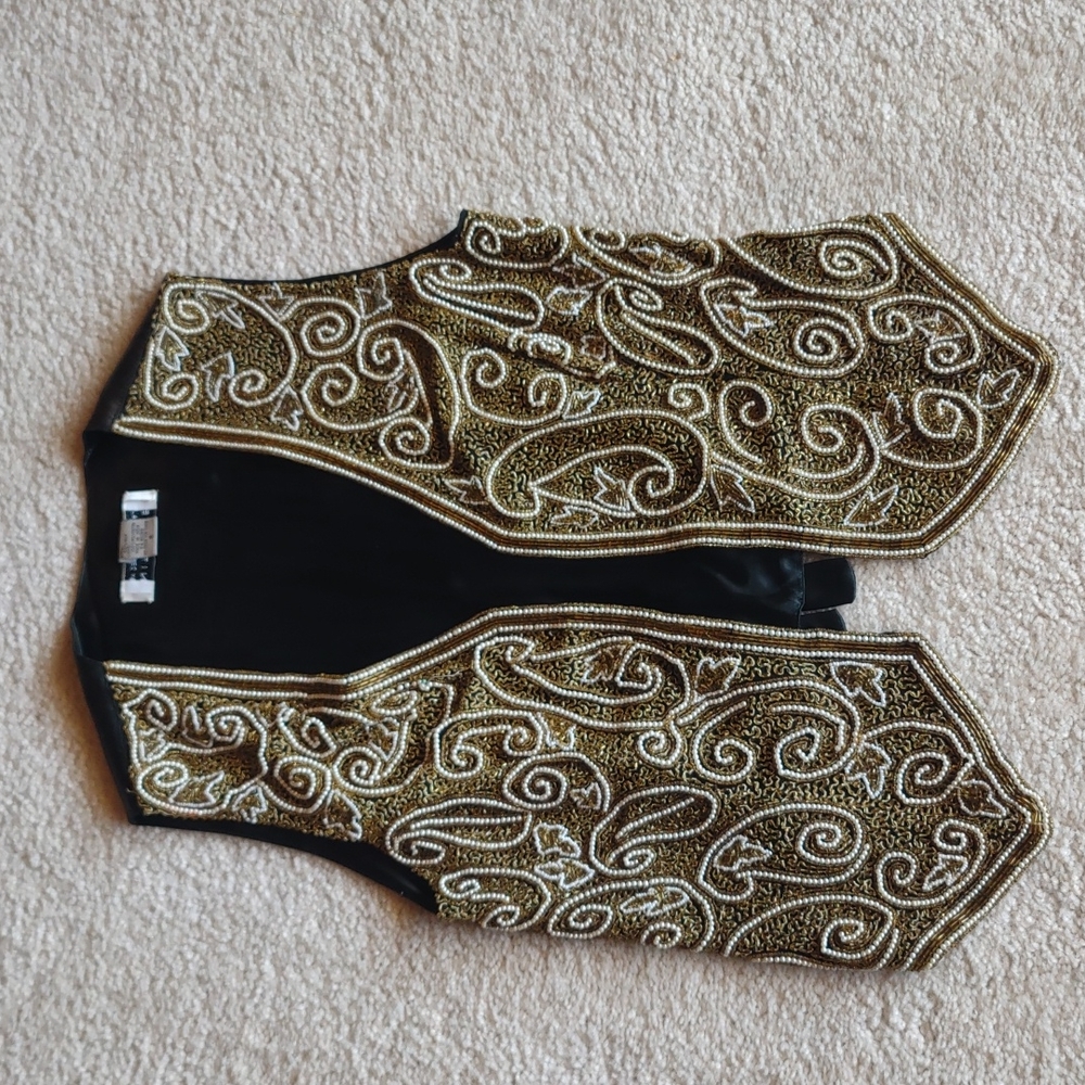 Heavily beaded vest with 100% Silk Shell